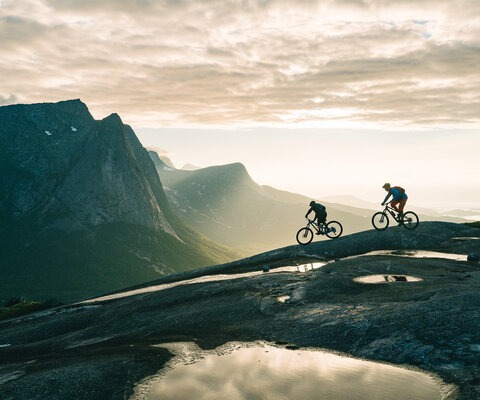 Jaime Hill and Daniel Larsson dropping into the continuous 1,150-foot slickrock descent of Henriknesfjellet. Narvik, Norway.