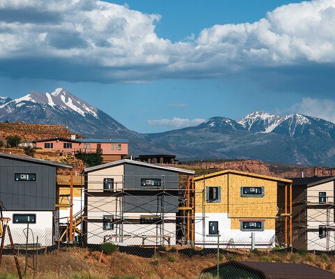 The still-under-construction Murphy Flats housing development is dwarfed by snowcapped peaks near Moab, Utah. Photo: Matthew Tangeman