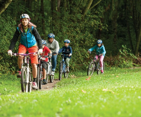 Kat Sweet leads the children on to a sweet ride at St. Edwards State Park.