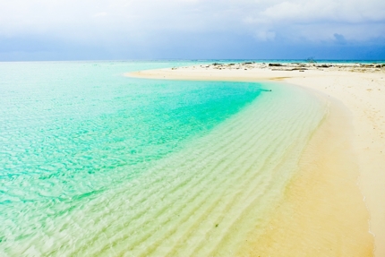 A sandy beach on Maratua Island, part of Derawan